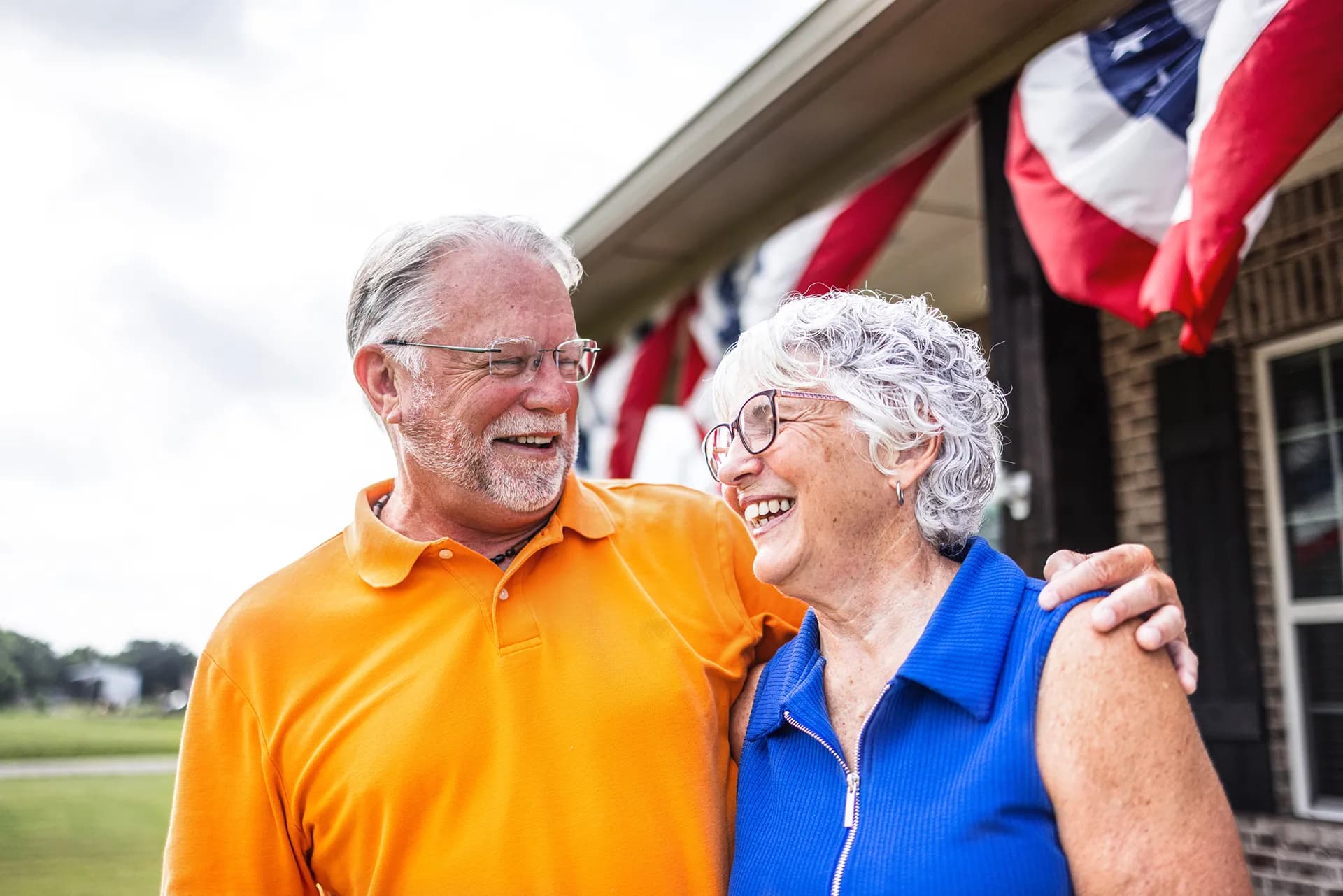 An older man and woman laughing