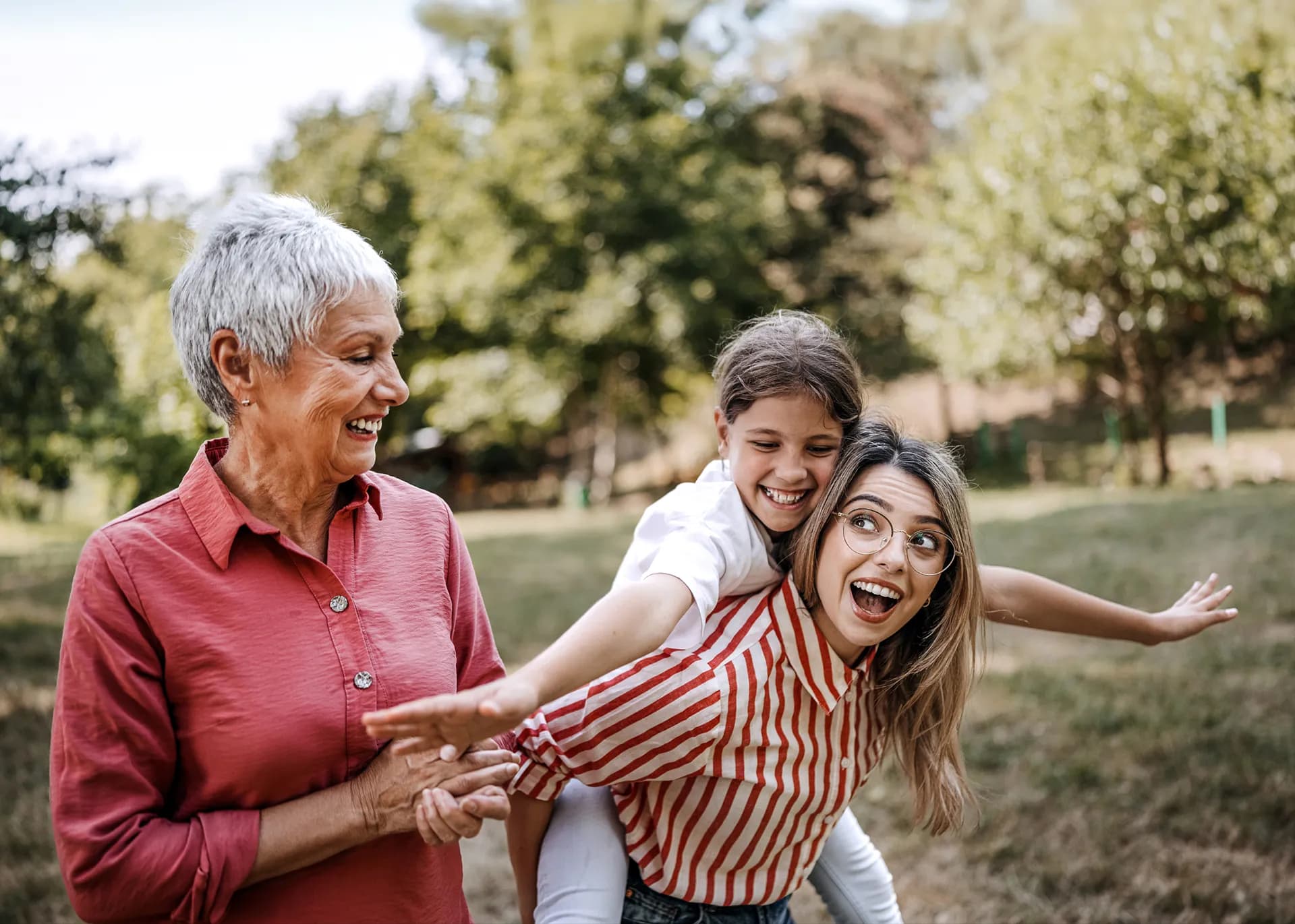 Family playing in a field